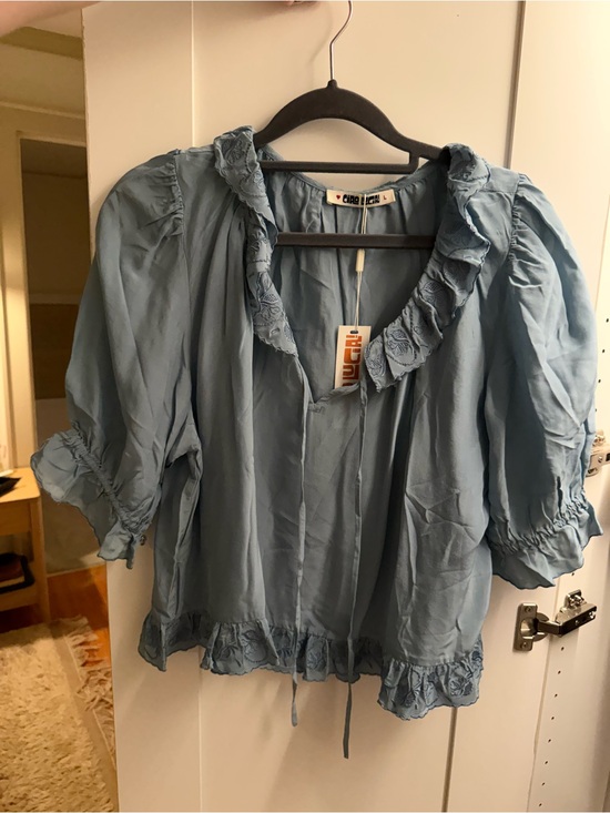 Ciao Lucia Tops - Ciao Lucia Light Blue Ruffled Peasant Blouse